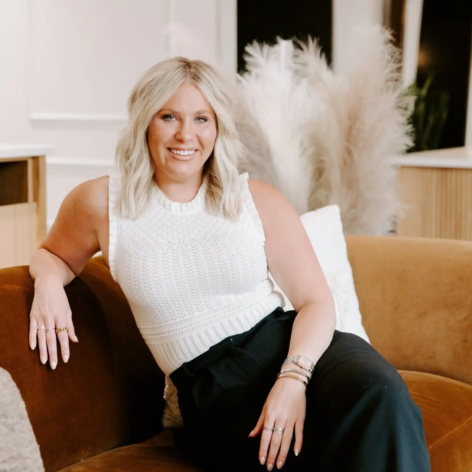 Portrait of Laine, a professional stylist at Solo Salon, showcasing their expertise and style.