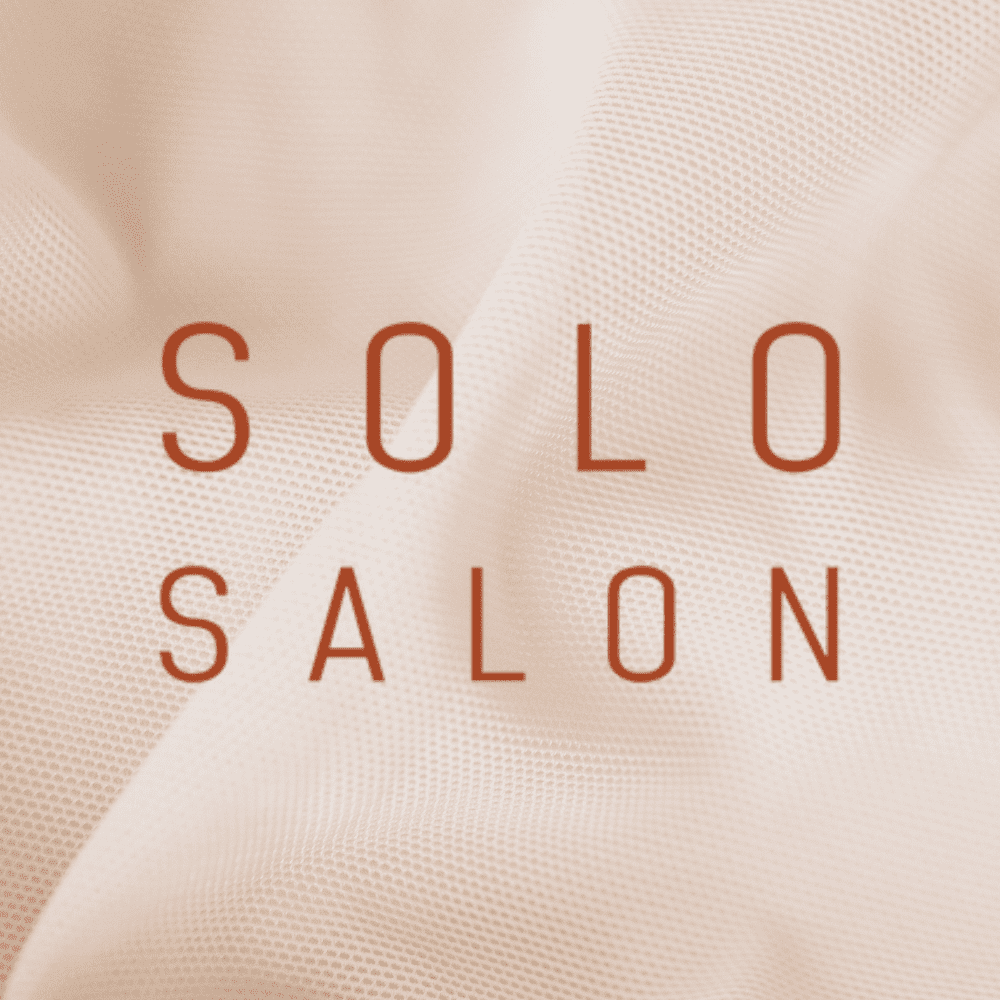 Portrait of Wyatt, a professional stylist at Solo Salon, showcasing their expertise and style.