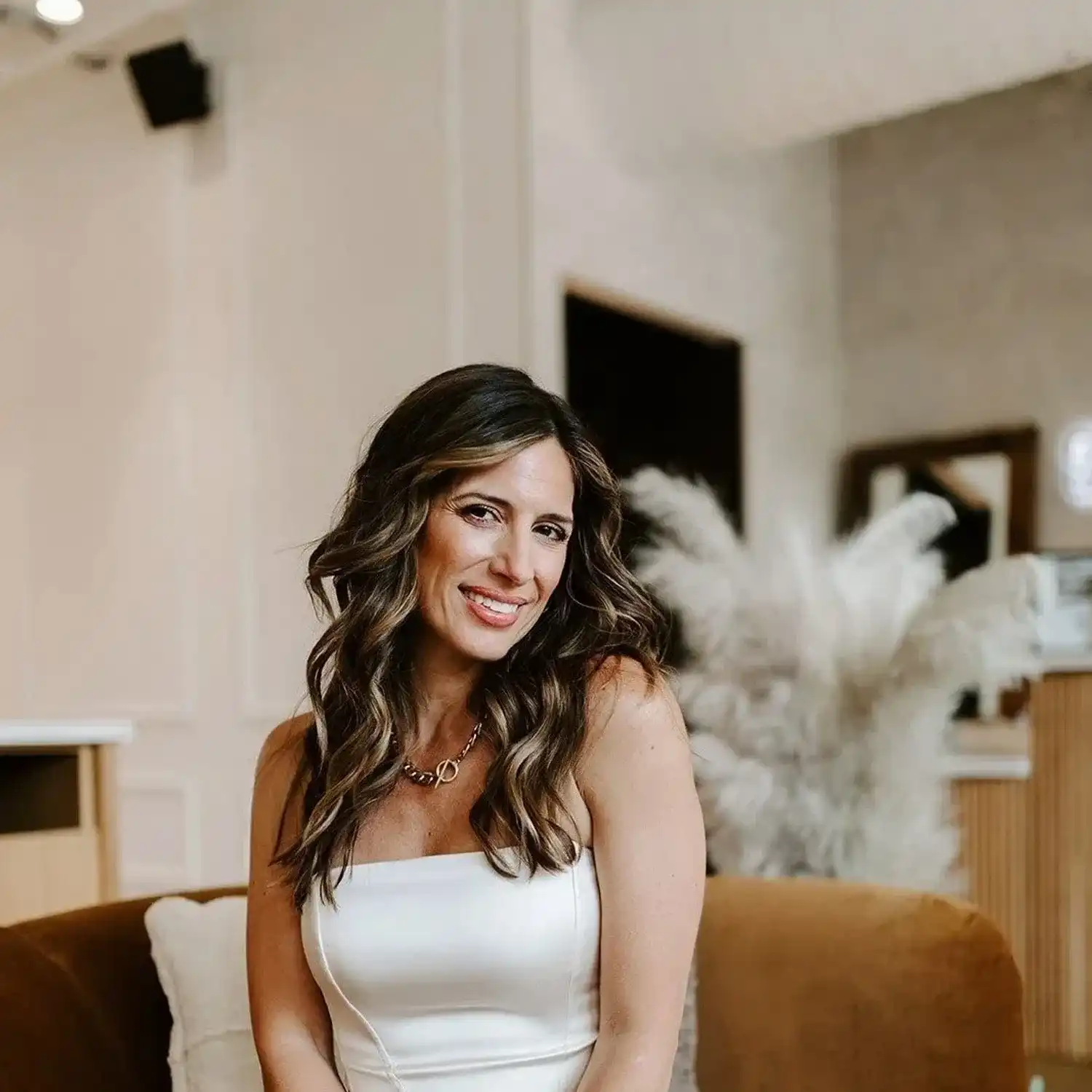Portrait of Kristine, a professional stylist at Solo Salon, showcasing their expertise and style.