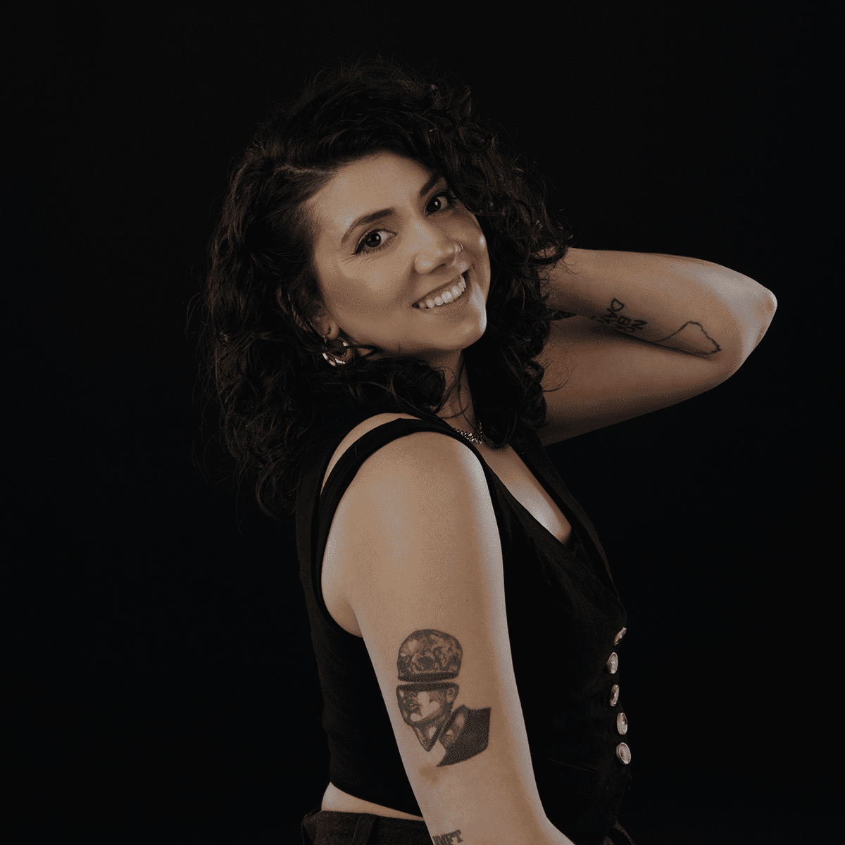 Portrait of Holly, a professional stylist at Solo Salon, showcasing their expertise and style.