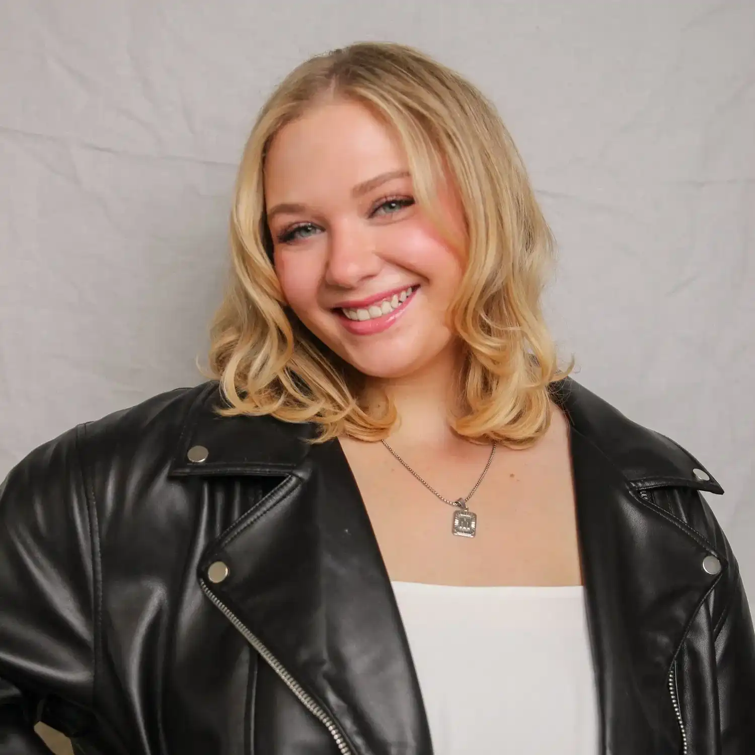 Portrait of Mallory, a professional stylist at Solo Salon, showcasing their expertise and style.