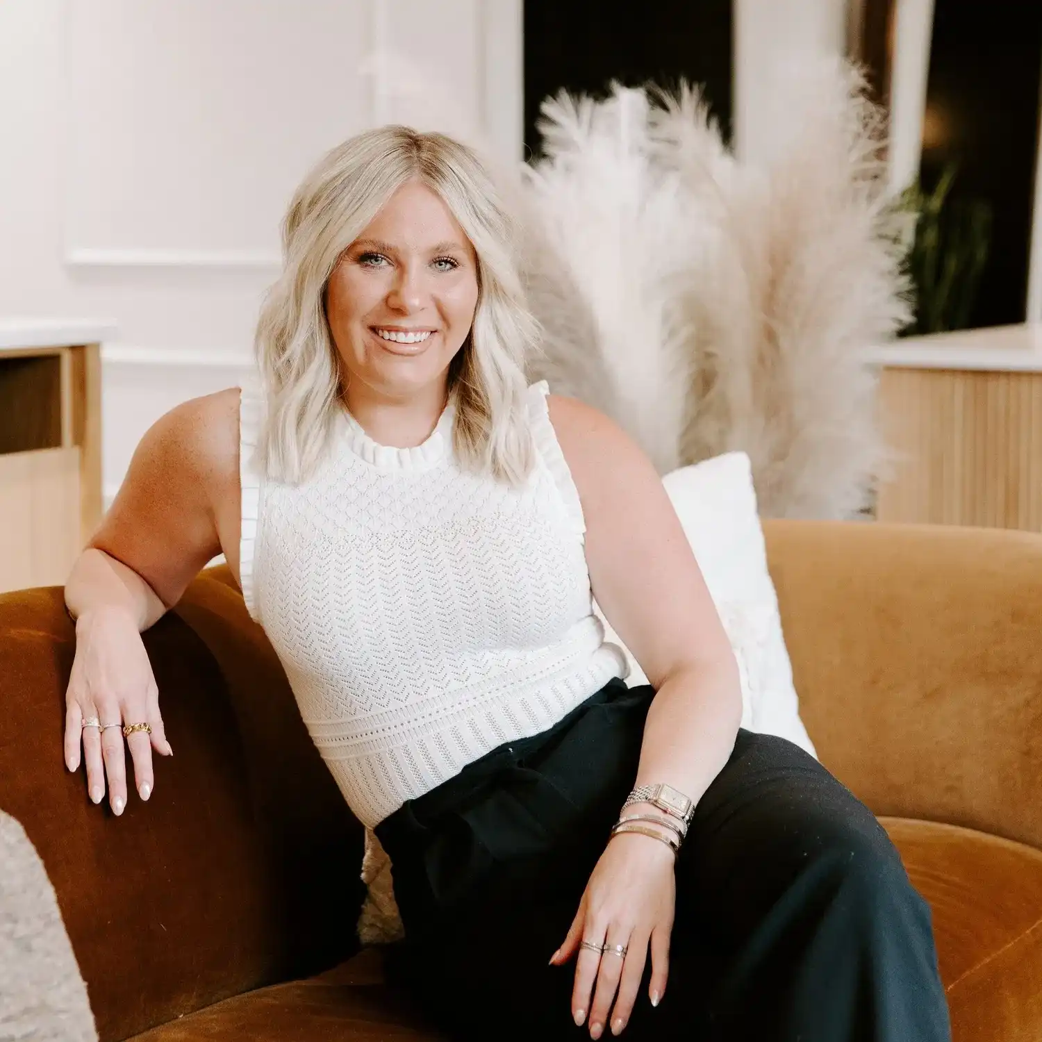 Portrait of Laine, a professional stylist at Solo Salon, showcasing their expertise and style.