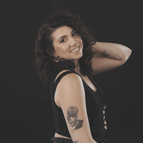 Portrait of Holly, a professional stylist at Solo Salon, showcasing their expertise and style.