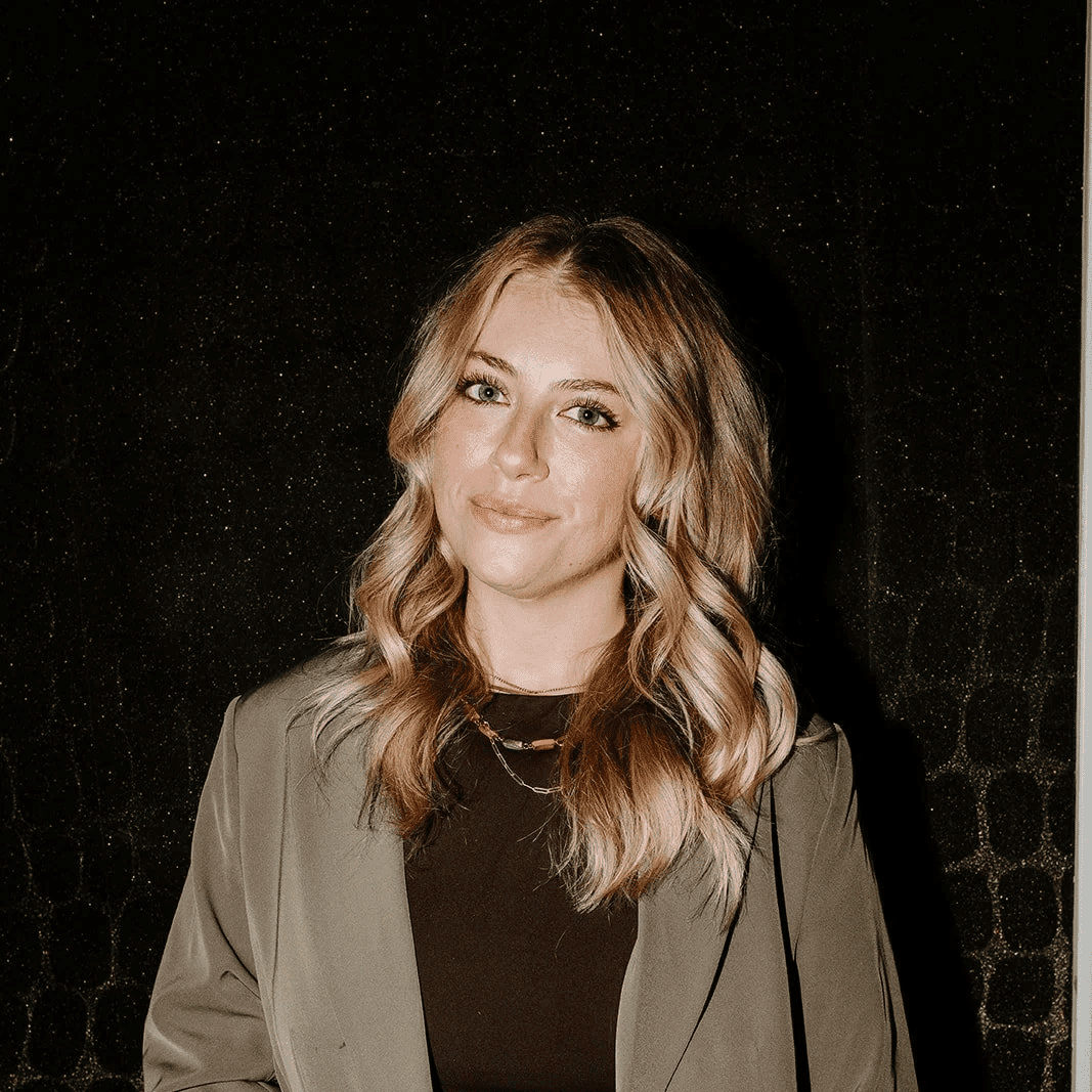 Portrait of Liz, a professional stylist at Solo Salon, showcasing their expertise and style.