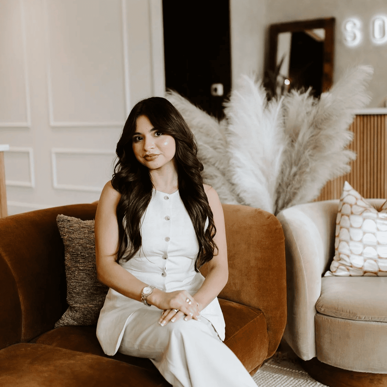 Portrait of Priscilla, a professional stylist at Solo Salon, showcasing their expertise and style.