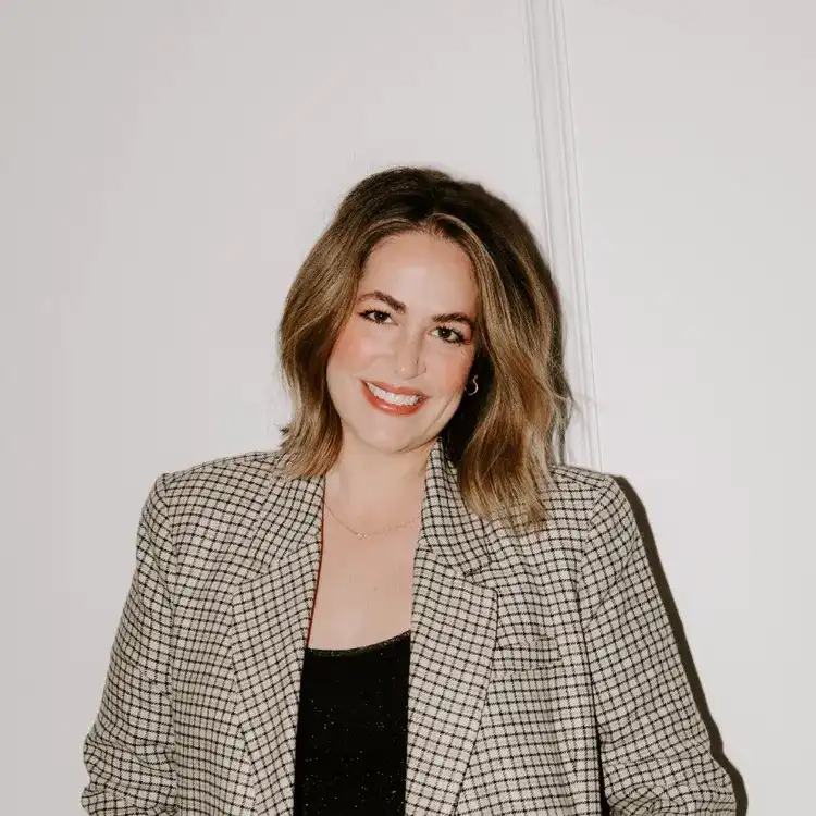 Portrait of Carly, a professional stylist at Solo Salon, showcasing their expertise and style.