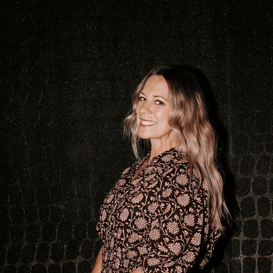 Portrait of Meg, a professional stylist at Solo Salon, showcasing their expertise and style.