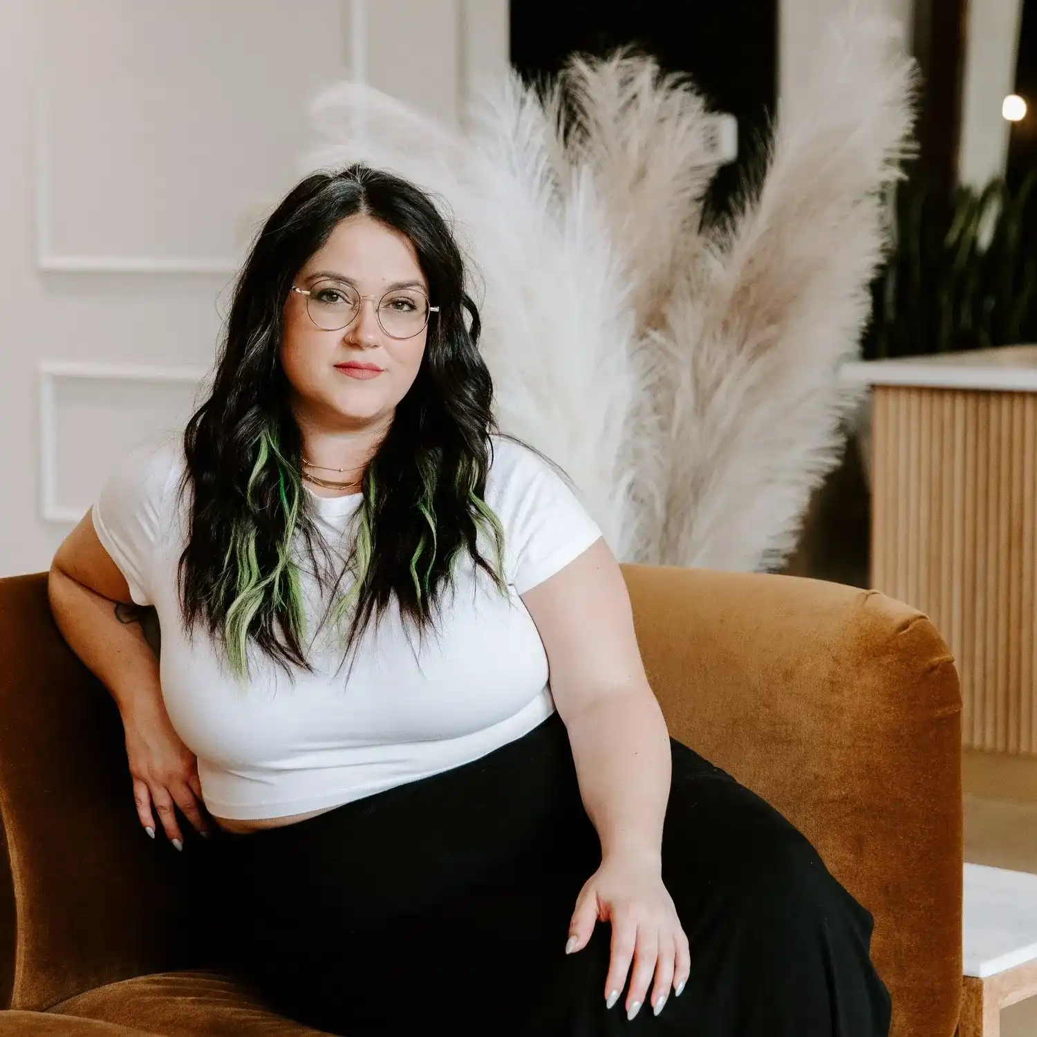 Portrait of Paige (formerly Elizabeth), a professional stylist at Solo Salon, showcasing their expertise and style.