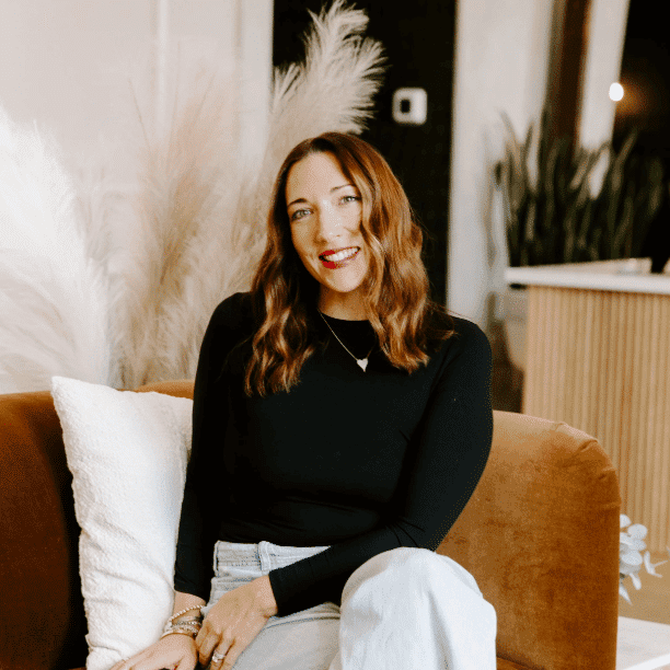 Portrait of Colleen, a professional stylist at Solo Salon, showcasing their expertise and style.