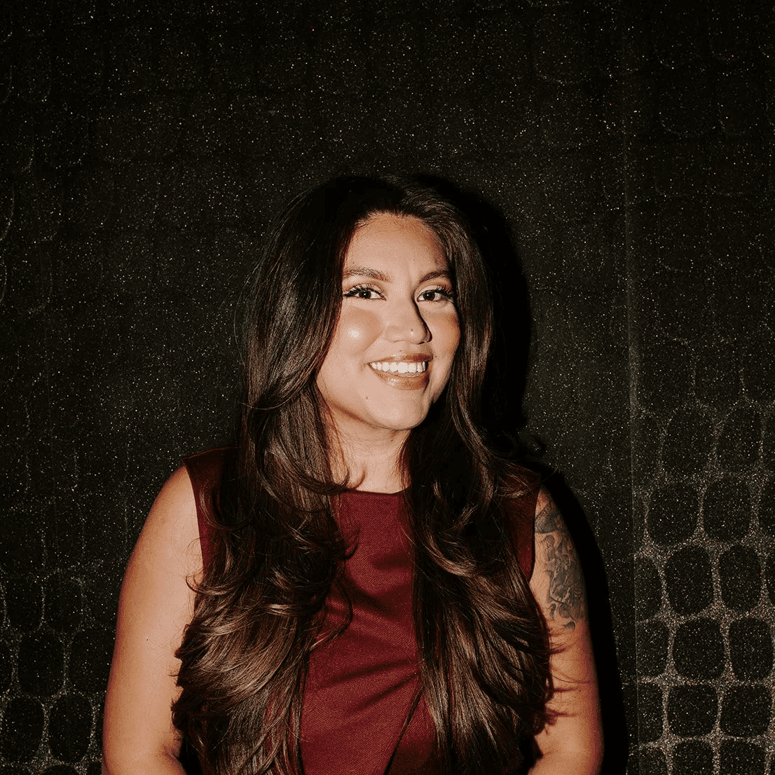 Portrait of Letty, a professional stylist at Solo Salon, showcasing their expertise and style.