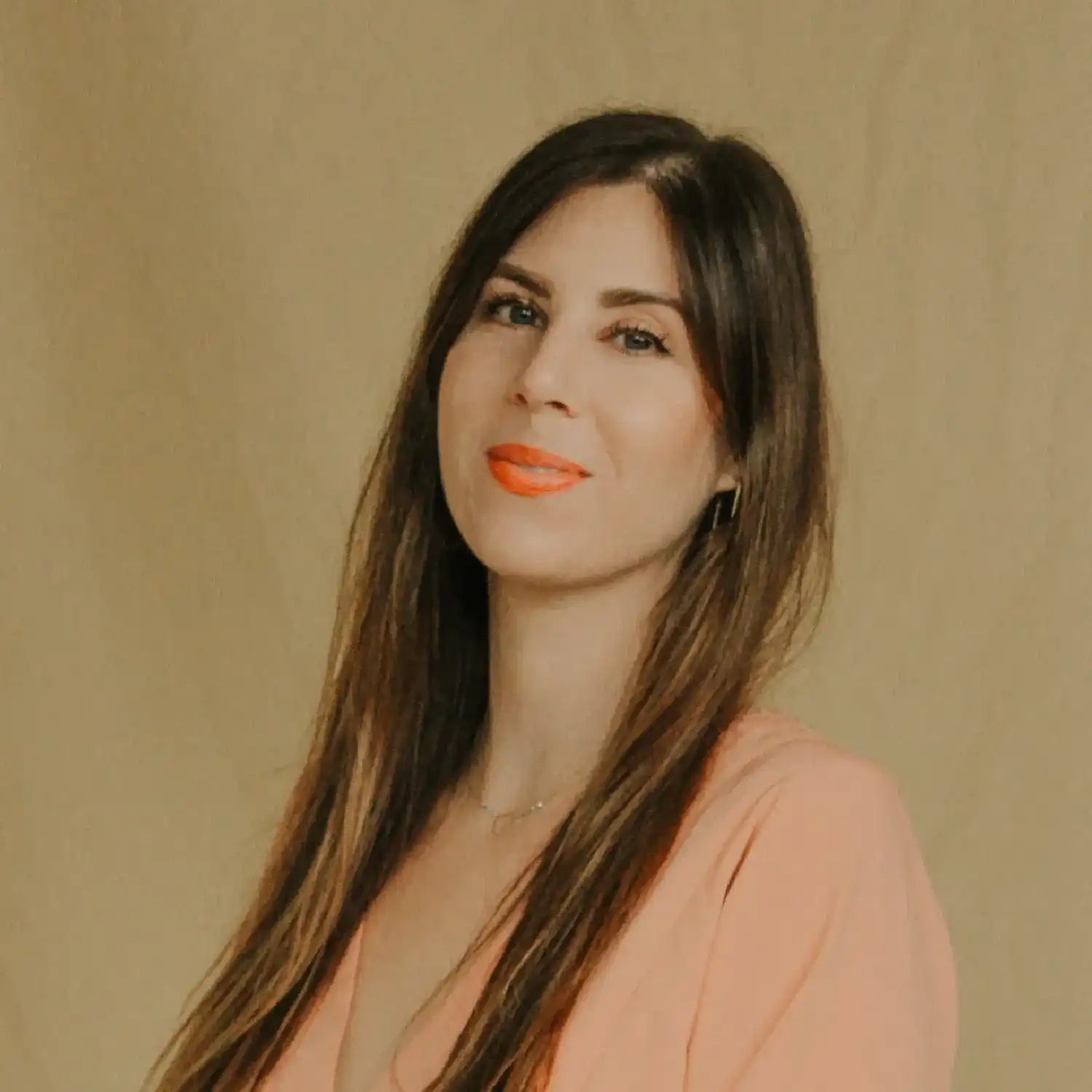 Portrait of Ashley, a professional stylist at Solo Salon, showcasing their expertise and style.